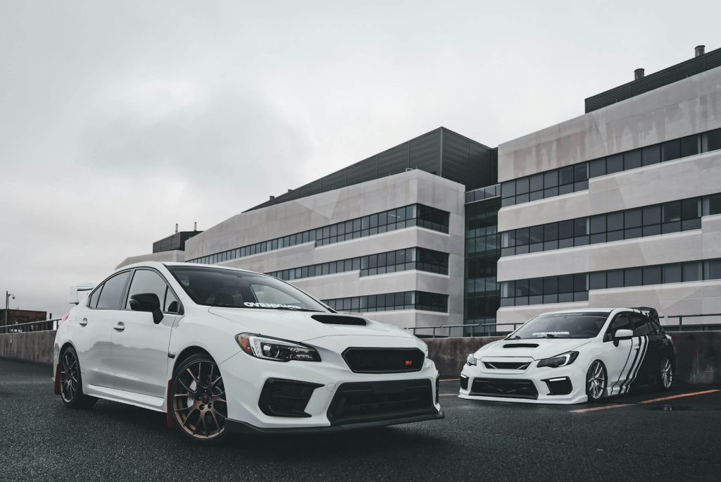 two white subaru sports cars